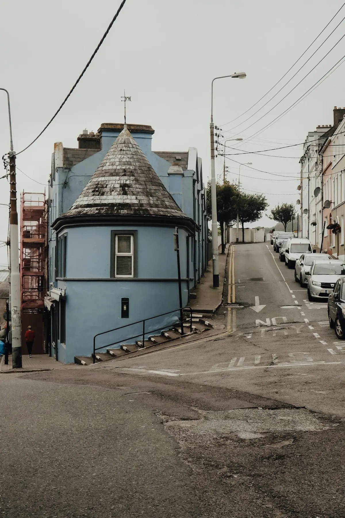 Cars parked on a steep street in Cork